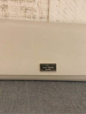 kate spade Cream White Leather wallet with Gold Plaque
